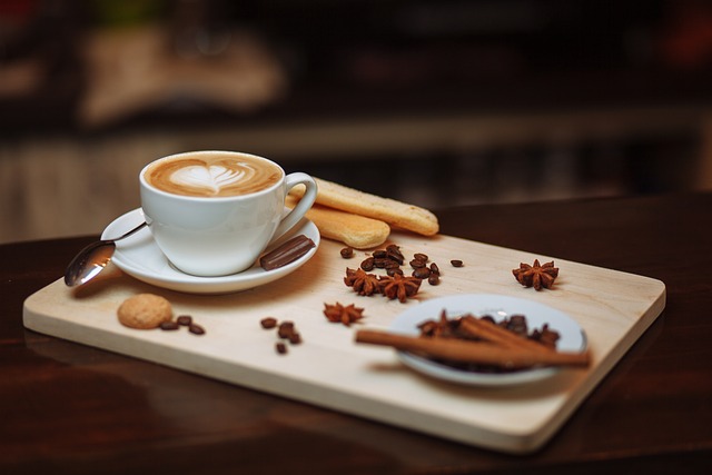 This image is of coffee on a table will Fall decor around it. Coffee is a popular drink that does stain teeth, making teeth whitening a popular option for longtime coffee drinkers!